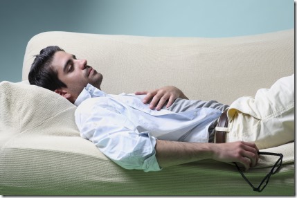 young man resting in a sofa _ Horizontal